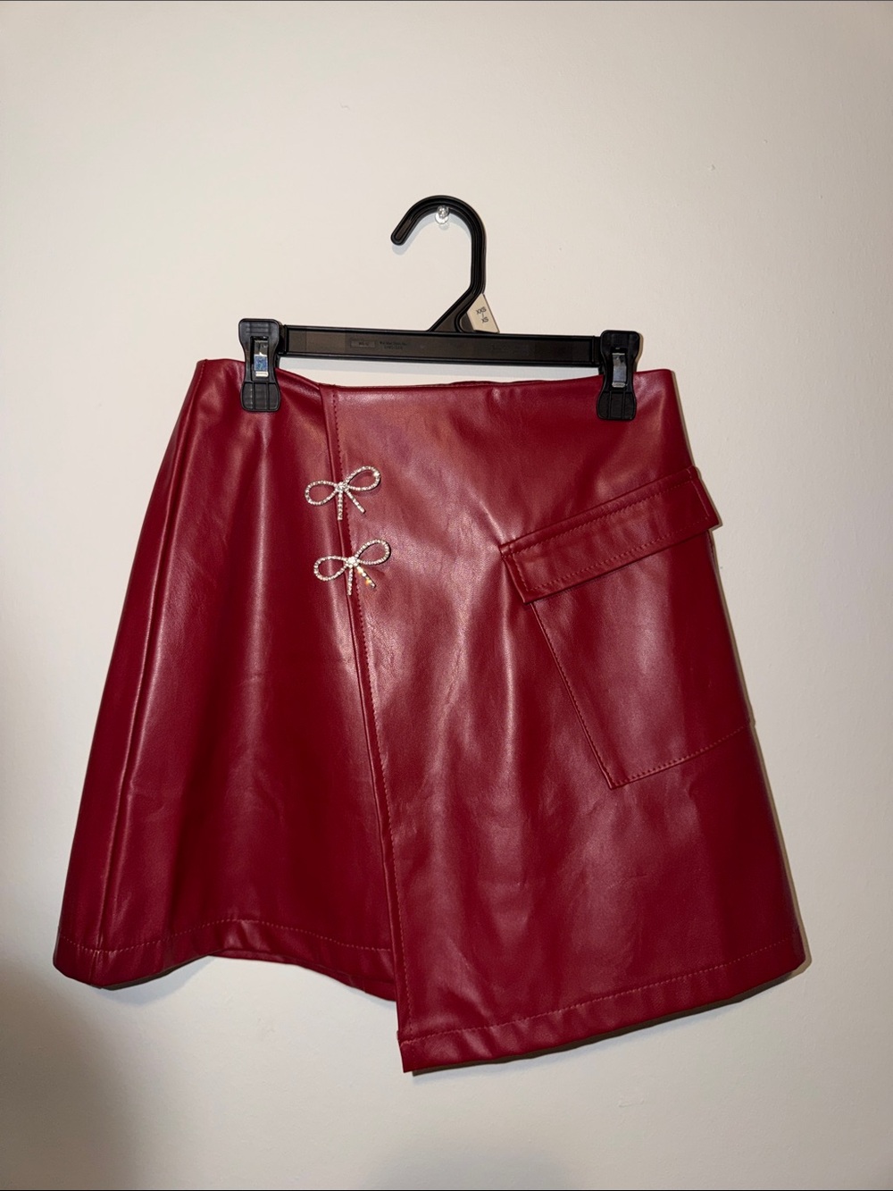Red Faux Leather Mini Skirt with Bow Accents